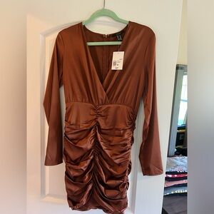 Forever 21. Size Medium, rust color dress. Never worn!